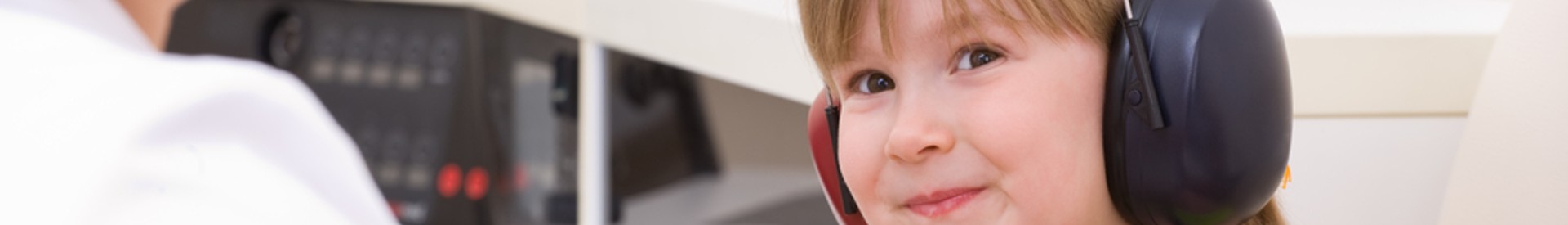 Little girl takes hearing test