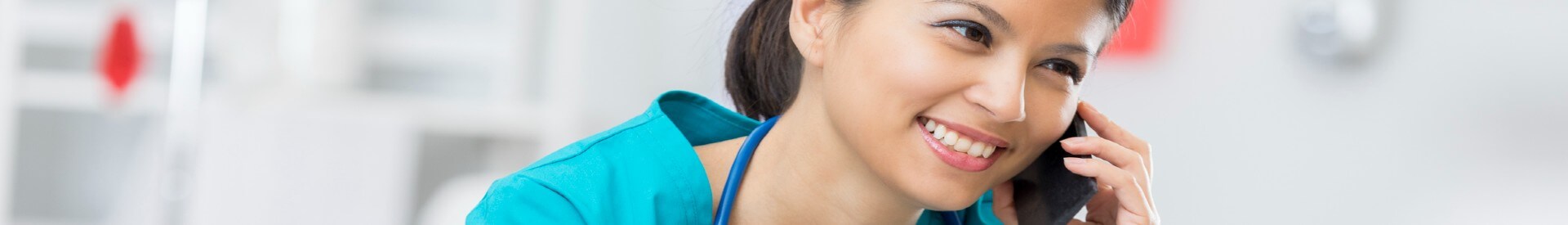 Nurse Smiling Talking on Phone